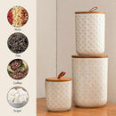 JOJUNO White Ceramic Canister Set with Wooden Lids – 3-Piece Airtight Food Storage Jars for Kitchen, Embossed Design, Small/Medium/Large Sizes (12/30/48 oz) – Flour, Sugar, Coffee, Tea Containers by CozyNest Decor