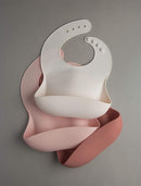 Loulou Lollipop Soft, Waterproof Silicone Feeding Bib by TinyTreasures Baby Boutique