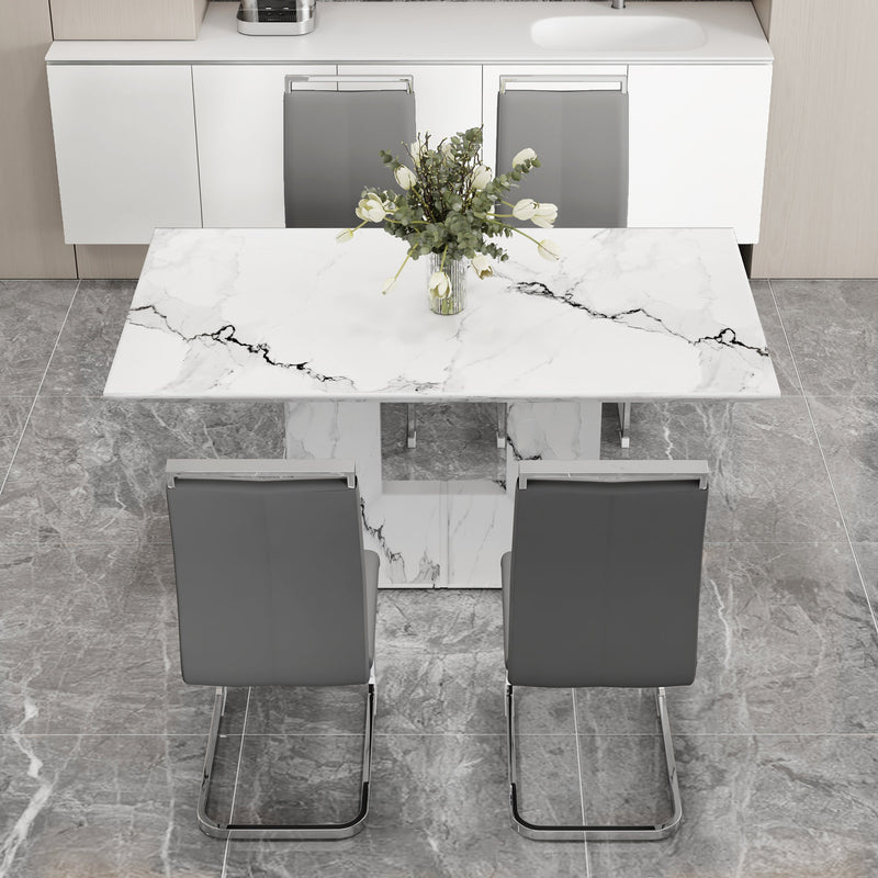 A simple dining table. A dining table with a white marble pattern. 4 PU synthetic leather high backrest cushioned side chairs with C-shaped silver metal legs. DT-SQ-16090-wh