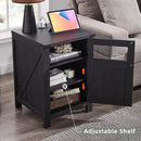 JXQTLINGMU Farmhouse End Table with Charging Station, 18'' Rustic Nightstand with Barn Door & Adjustable Shelf, Wooden Sofa Side Table with 3-Tier Storage for Living Room, Bedroom, Black by CozyNest Decor
