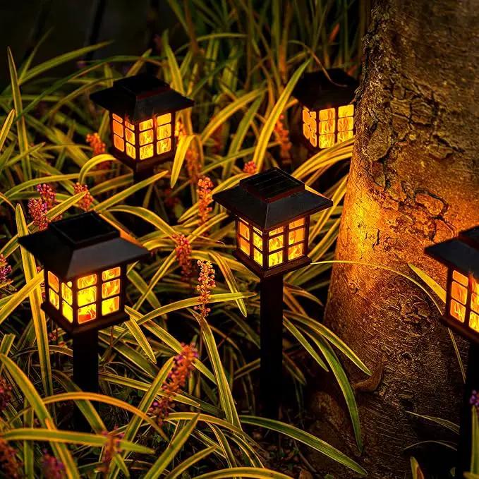 GIGALUMI Solar Lights for Outside,12 Pack Flickering Flame LED Solar Outdoor Lights, Waterproof Solar Garden Lights Maintain 10 Hours of Lighting for Christmas, Garden, Landscape, Path, Yard, Patio, photo 8 of 8