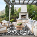 GENIMO Outdoor Rug Waterproof for Patio Decor, 8' x 10' Reversible Plastic Straw Floral Camping Carpet, Large Area Rugs Mats for RV, Camper, Deck, Balcony, Porch, Beach, Picnic, Black & White by CozyNest Decor