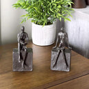 Danya B. Metal Art Shelf Decor - Decorative Cast Iron Bookend Set - Man and Woman Reading on a Block by CozyNest Decor