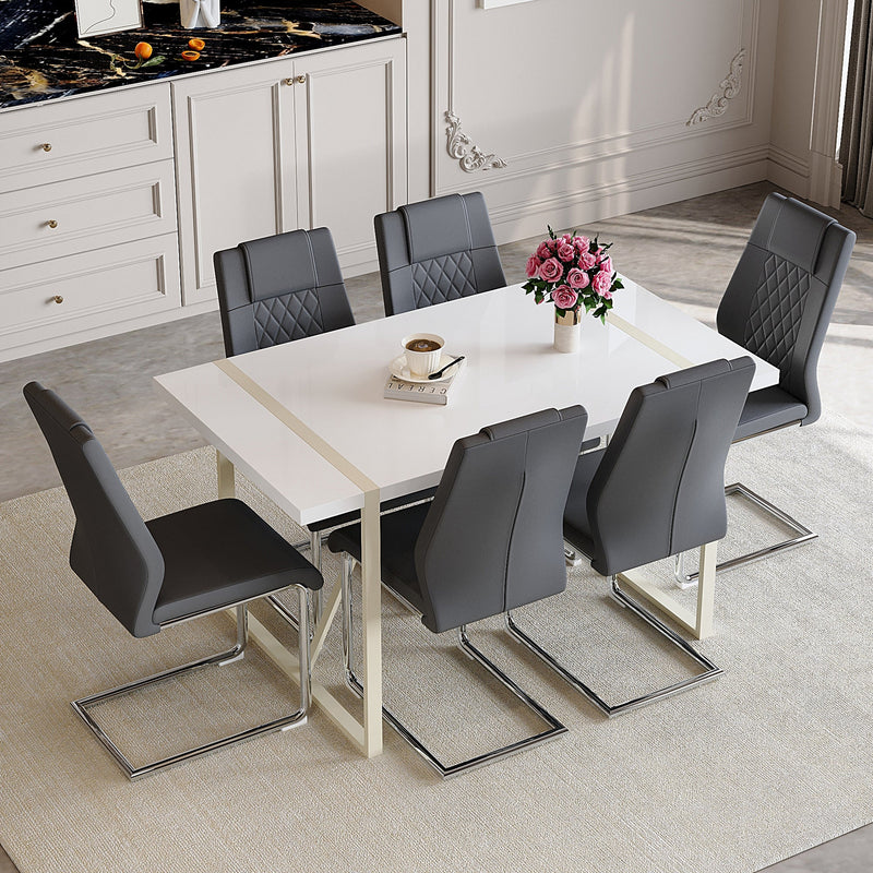 Table and chair set.55'x31.4' Cream-Style White MDF Dining Table Set with 6 Dark Gray Chairs With Silver Metal Legs.MDF Tabletop and metal frame legs.Adding a warm atmosphere to your family.