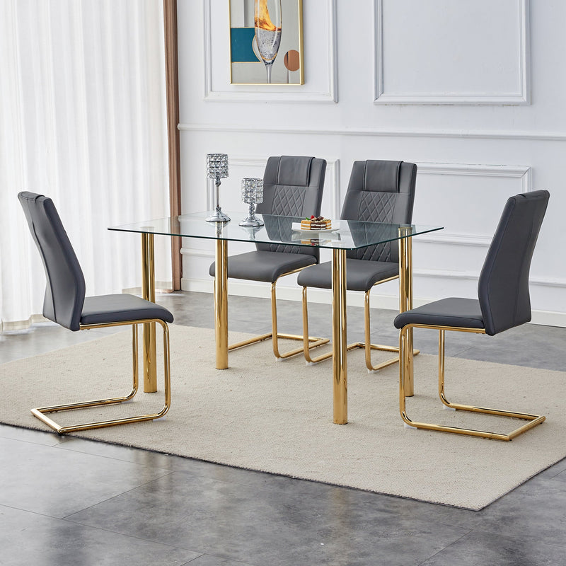 A modern minimalist style glass dining table. Transparent tempered glass tabletop with a thickness of 0.3 feet and golden metal legs. Suitable for restaurants and living rooms. 51"x31.4"x29.5"