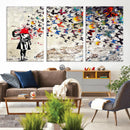 Banksy Art Butterfly Girl Explosion Canvas Art – Vibrant