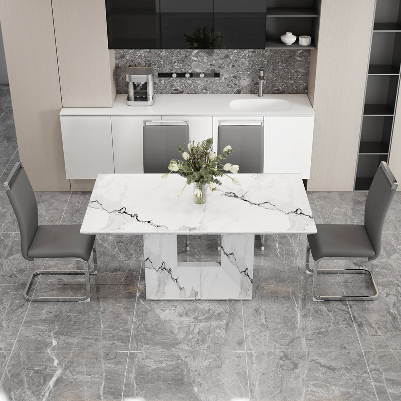 A simple dining table. A dining table with a white marble pattern. 4 PU synthetic leather high backrest cushioned side chairs with C-shaped silver metal legs. DT-SQ-16090-wh