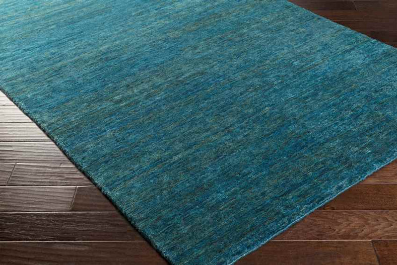 Cook Global Teal Area Rug