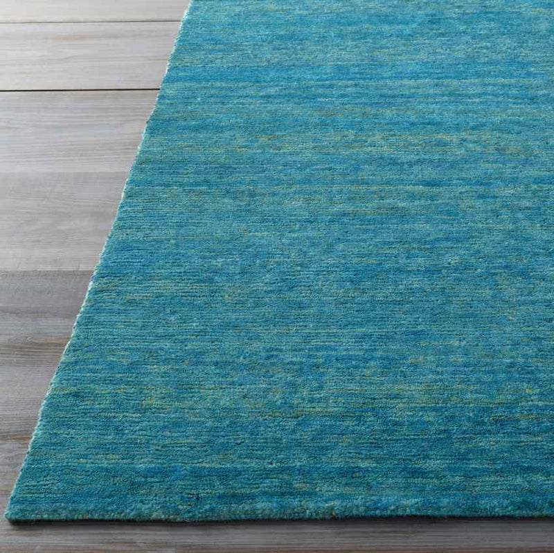 Cook Global Teal Area Rug