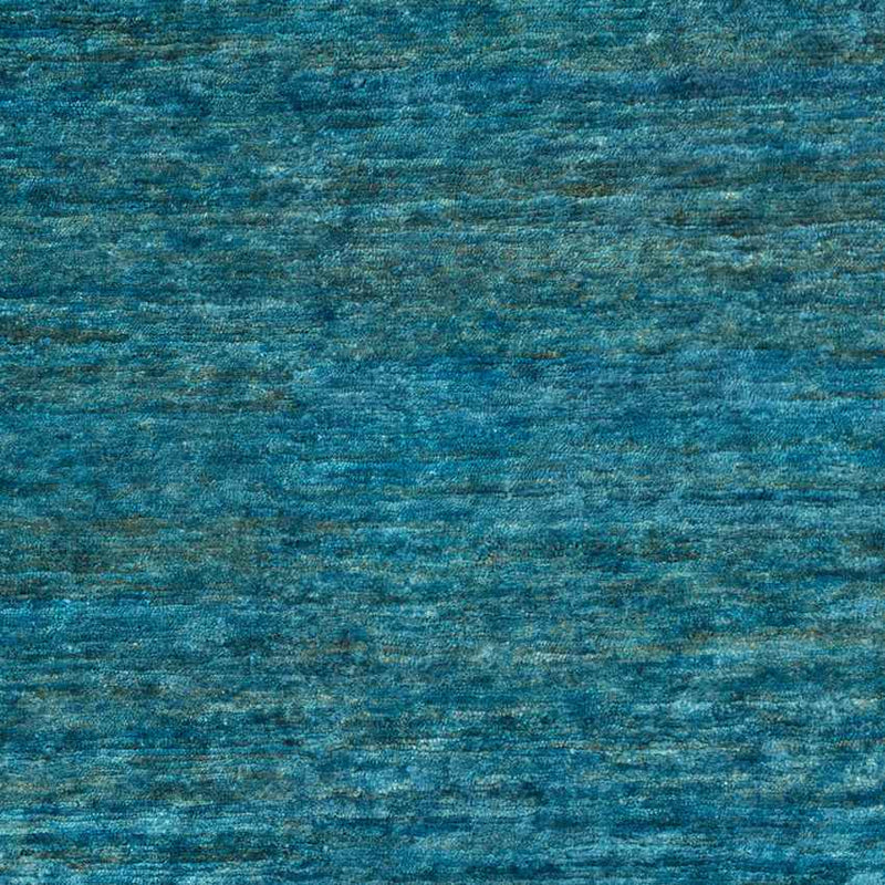 Cook Global Teal Area Rug