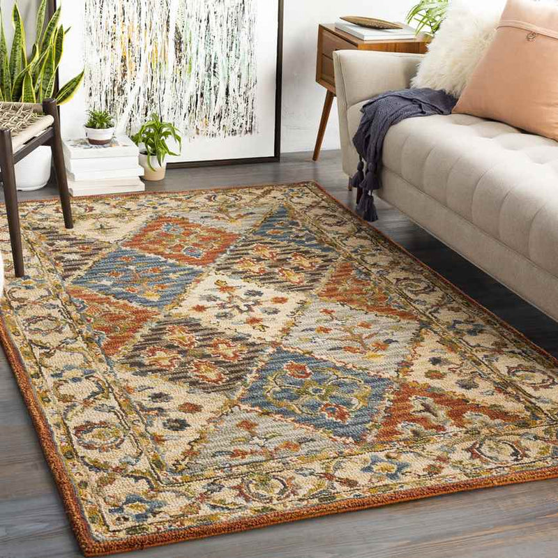 Tzummarum Traditional Clay Area Rug