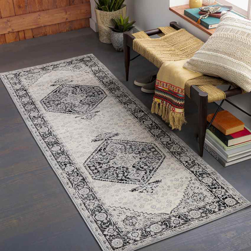 Lubbinge Traditional Black Area Rug