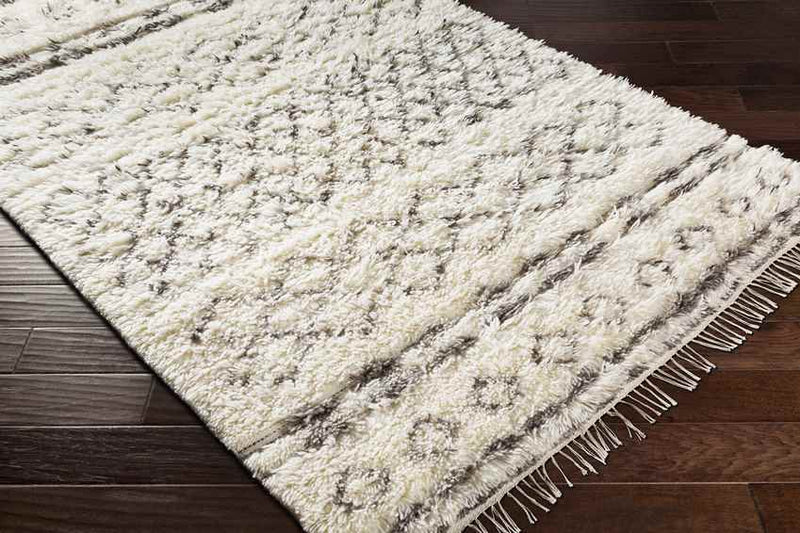 Harkstede Global Cream Area Rug