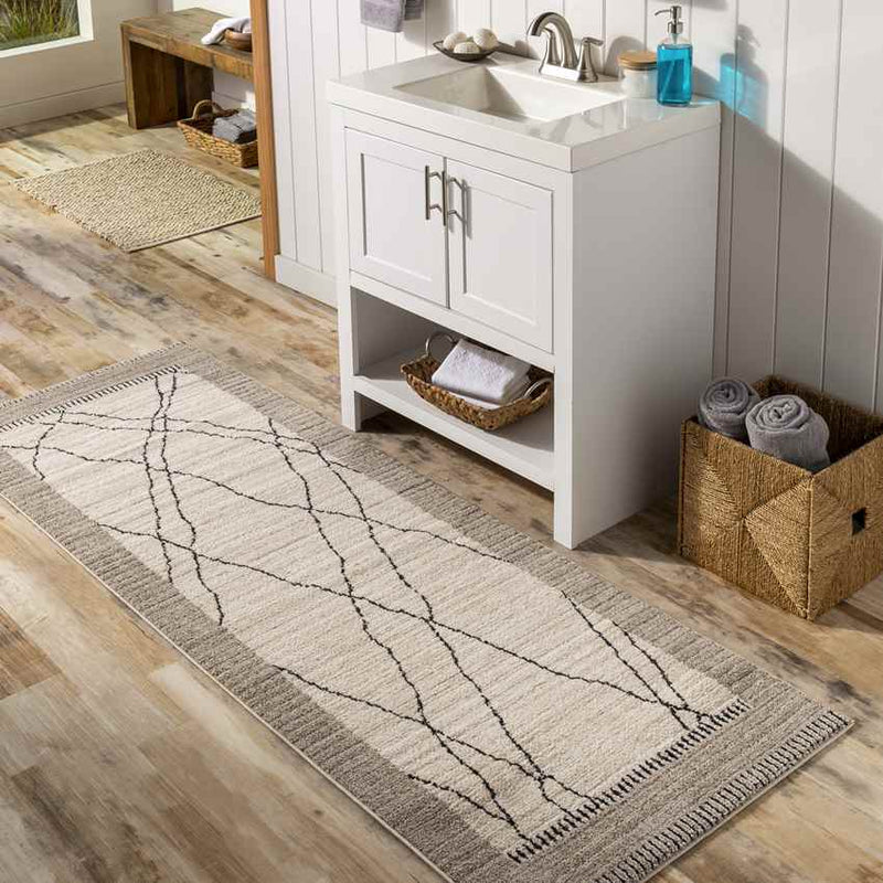 Chloraka Global Beige Area Rug