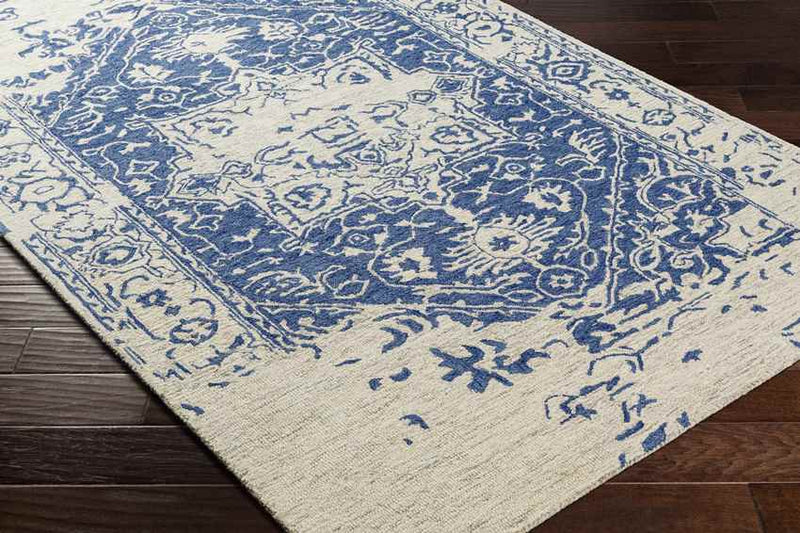 Vretsia Traditional Ink Blue Area Rug