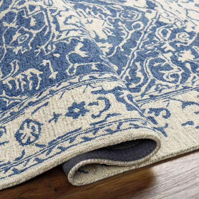 Vretsia Traditional Ink Blue Area Rug