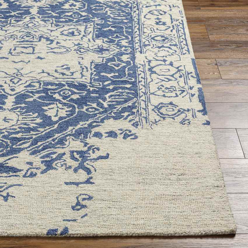 Vretsia Traditional Ink Blue Area Rug