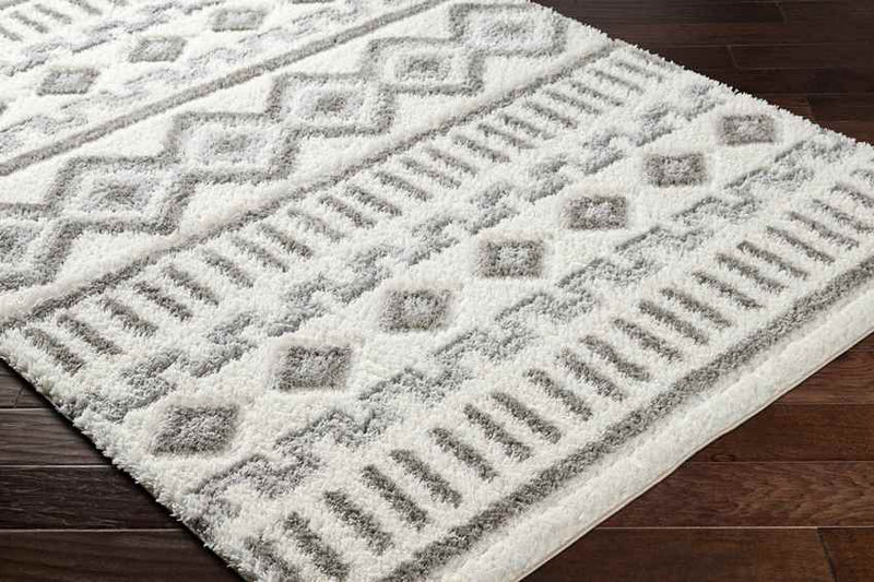 Nyeshia Global Cream Area Rug