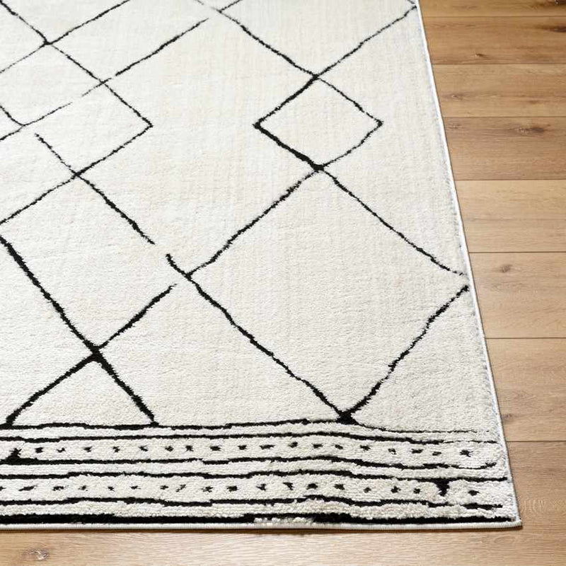 Josue Modern Ivory/Black Area Rug