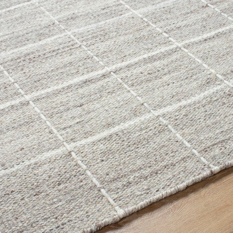 Ishaq Solid and Border Ivory/Tan Area Rug