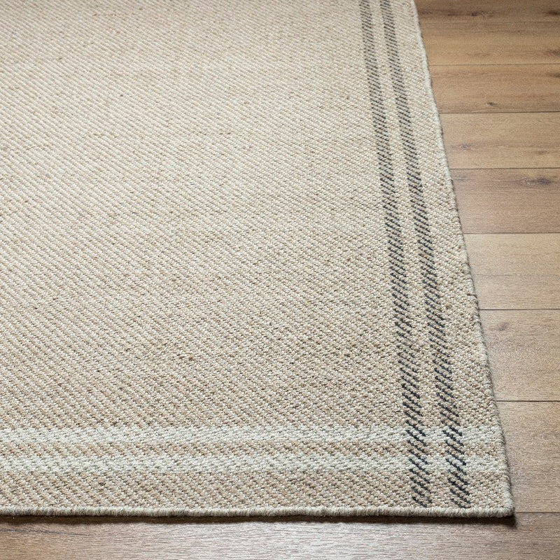 Janmichael Solid and Border Light Beige Area Rug