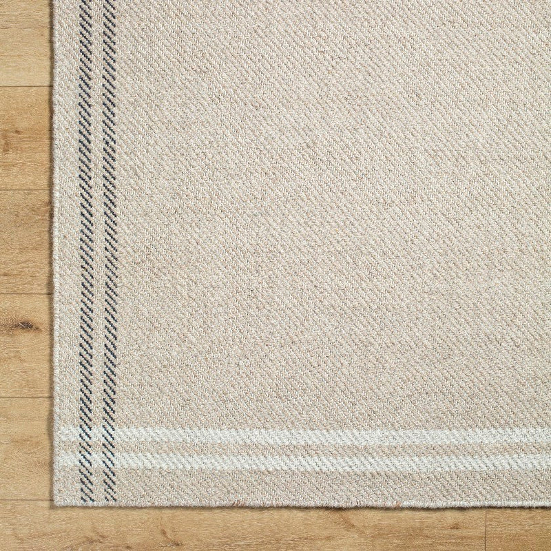 Janmichael Solid and Border Light Beige Area Rug