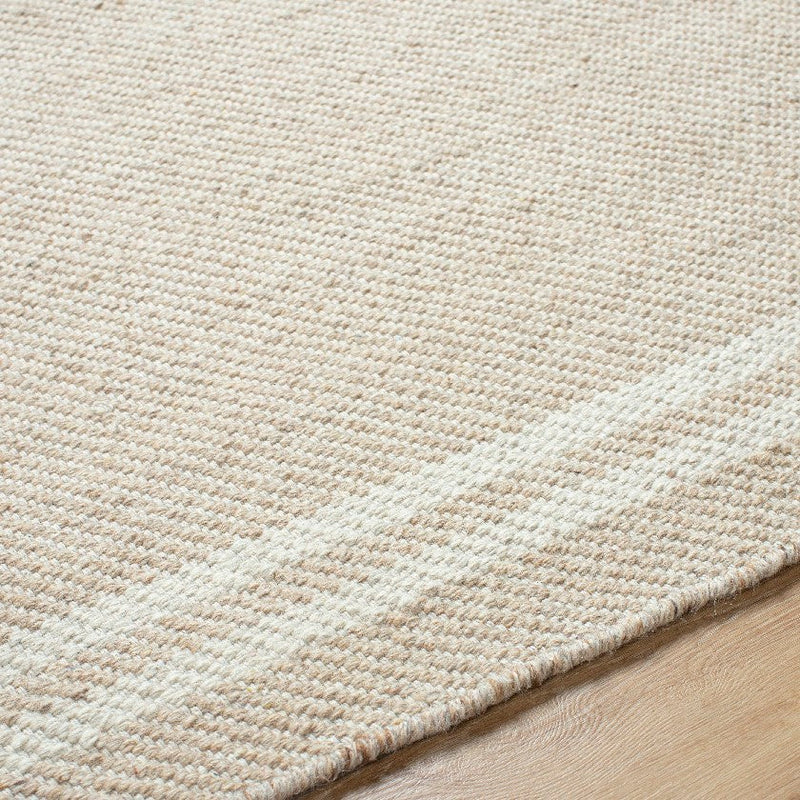 Janmichael Solid and Border Light Beige Area Rug