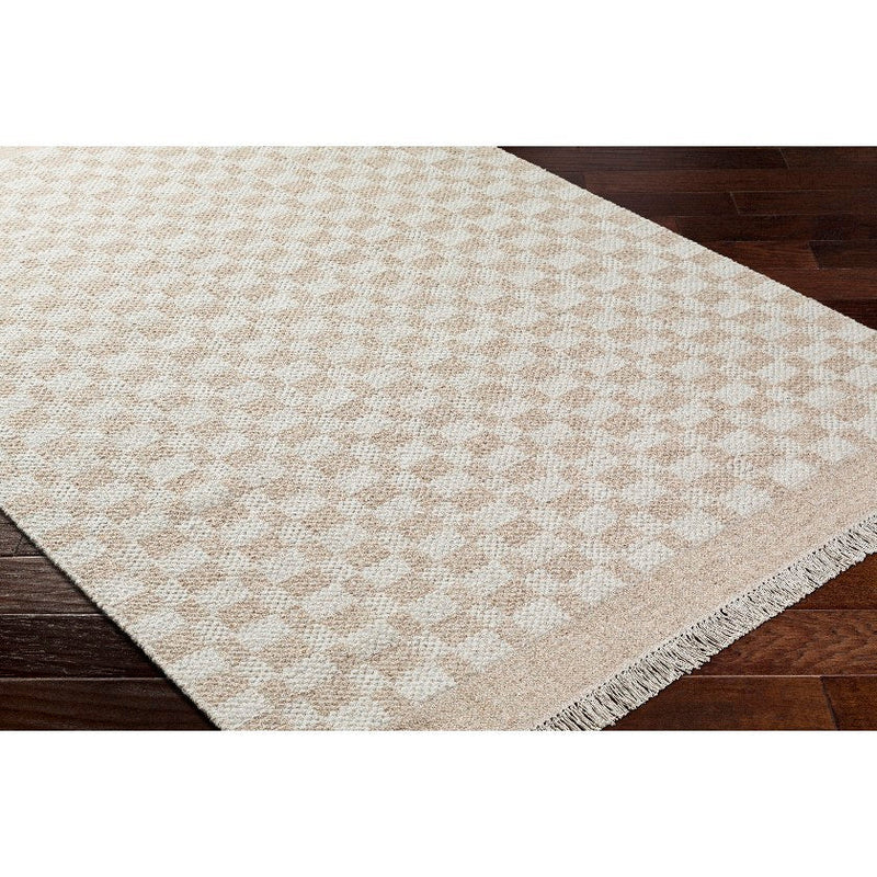 Clinten Solid and Border Tan Area Rug