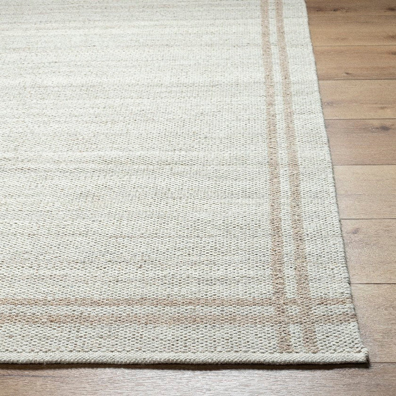 Janmichael Solid and Border Ivory Area Rug