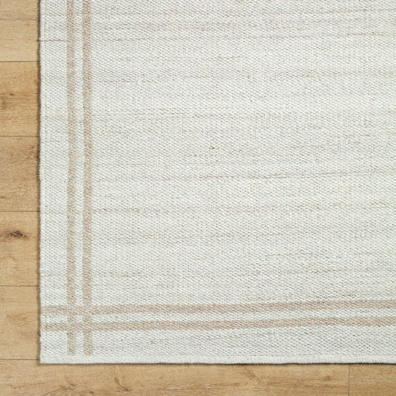 Janmichael Solid and Border Ivory Area Rug