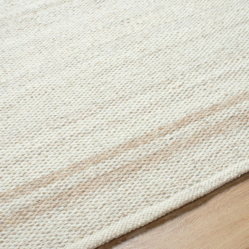 Janmichael Solid and Border Ivory Area Rug