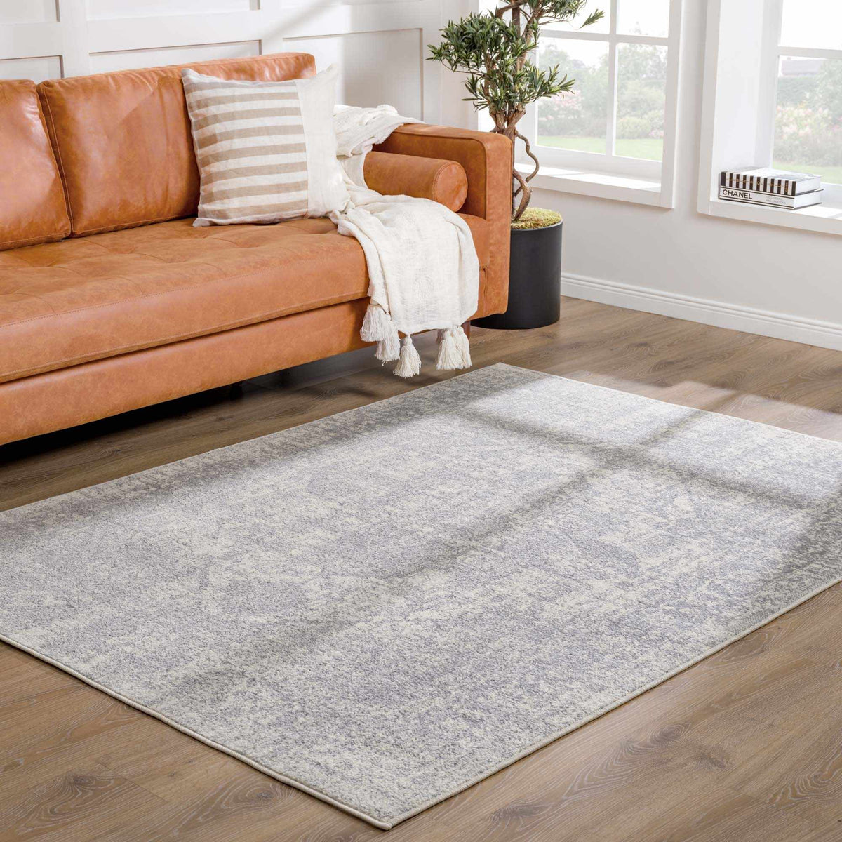 Peeta Gray Medallion Area Rug, installed in a room
