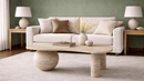 Catalina marble bean-shaped coffee table with single sphere pedestal base