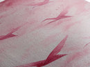 Crane Flight Canvas Print, ethereal origami bird painting in pink abstract hues, tall narrow wall art with zen minimalist aesthetic.