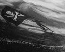 Surfer Waving A Skull and Crossbones Flag While Surfing - Framed Canvas Print - Cool Modern Art - Office / Mancave Decor Gift For Him
