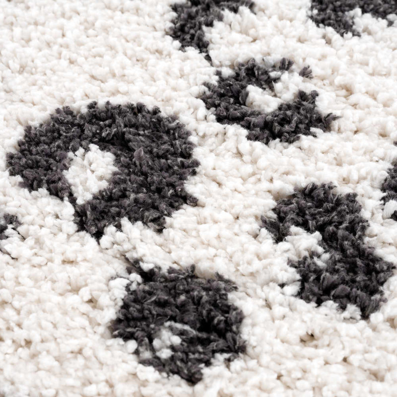 Zhen Black Spots White Leopard Shag Rug