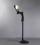 Ball Holding Sculpture Character Floor Lamp