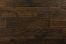 "Image of Oak Handscraped/Distressed Solid Hardwood Flooring in Blackmoon Oak. Each plank measures 3/4 x 4.75 inches. SKU: TRPSH-OBO."