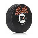 Bobby Brink Autographed Philadelphia Flyers Hockey Logo Puck with Orange Signature by Dynasty Sports & Framing