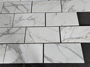 Calacatta Gold Marble Basketweave w/ Black Dots Honed Tile