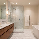 Modern bathroom with shower, bathtub, and wooden vanity. Turkish Carrara Marble 2"x2" on 12" x 12" Mesh Mosaic Tile