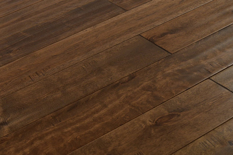 "Explore timeless beauty with Maple Distressed/Handscraped Solid Hardwood Flooring, 3/4 x 5 inches, in Century finish. Elevate your space with its rich texture and lasting charm. SKU: TRPSH-MPCT."