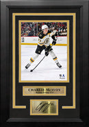 Charlie McAvoy in Action Boston Bruins 8" x 10" Vertical Framed Hockey Photo with Engraved Autograph by Dynasty Sports & Framing