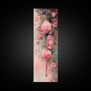Lantern Glow Canvas Print, whimsical Moroccan wall art with light pink tones and floral accents, tall skinny vertical wall art piece.