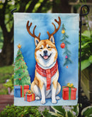 Akita Christmas Garden Flag – Dog in Reindeer Antlers with Tree & Gifts