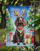 American Water Spaniel Christmas Garden Flag – Dog in Reindeer Antlers with Tree & Gifts