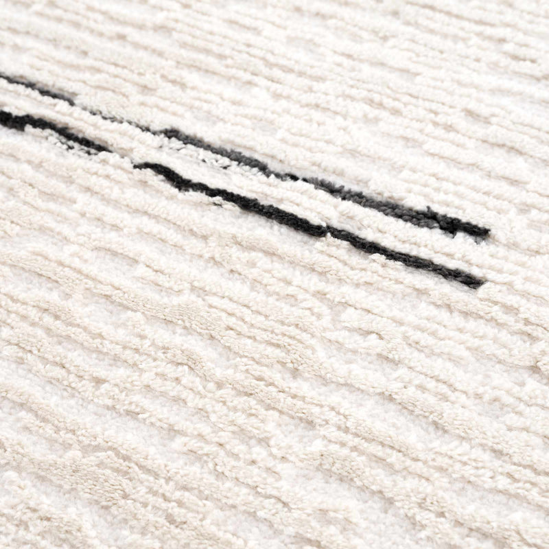 Riad Black Striped White Area Rug with tassels