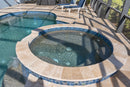 In-ground pool with hot tub on a deck 