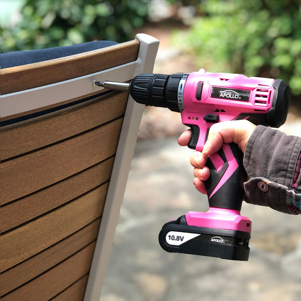 10.8 Volt Lithium-Ion Cordless Drill with 30 Piece Accessory Set PINK - DT4937P, installed in a room