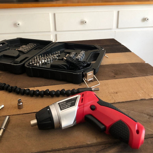 3.6 Volt Lithium-Ion Rechargeable Screwdriver with 45 Pieces Accessory Set - DT4944, installed in a room